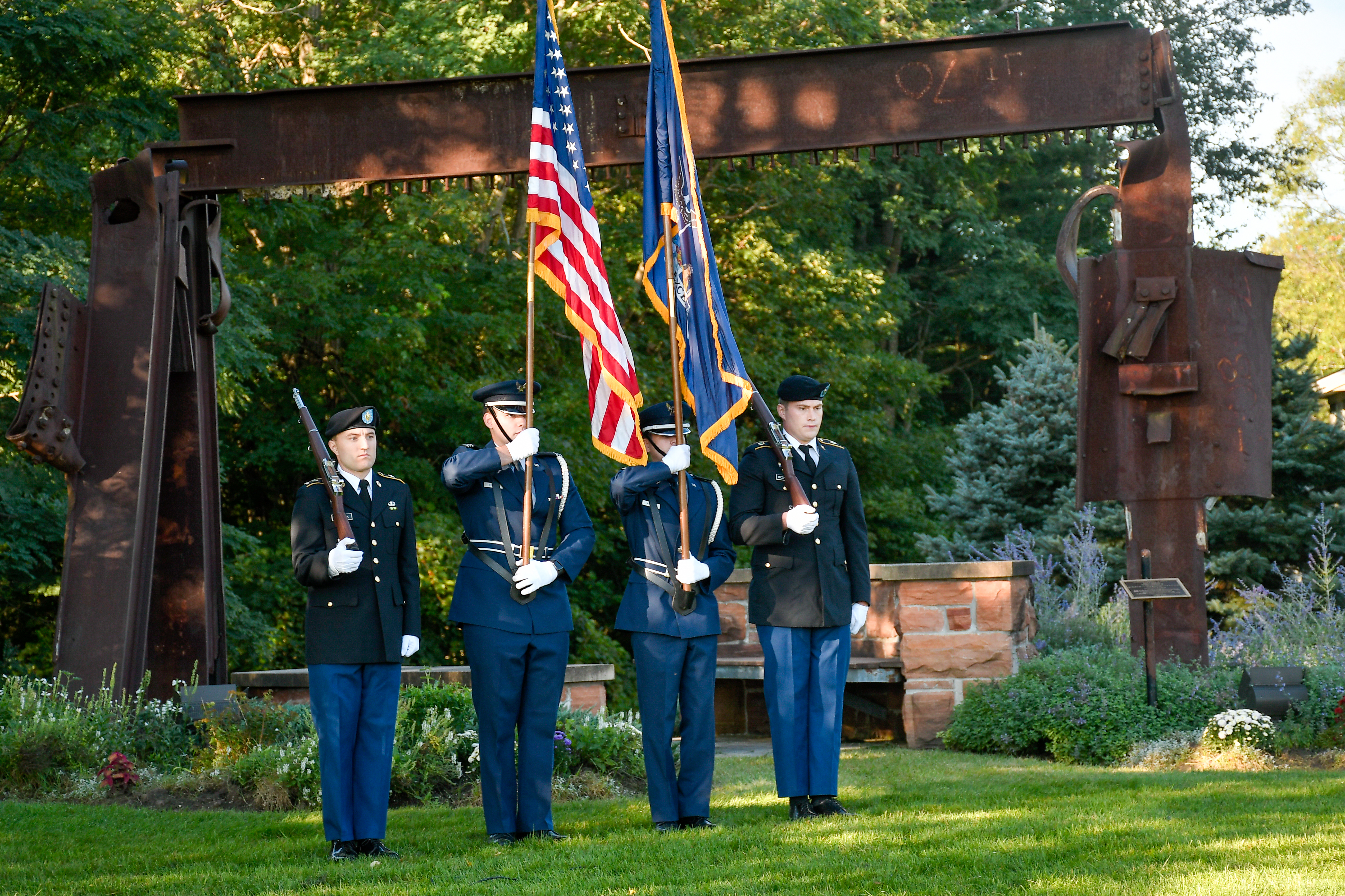 Army ROTC Cadets as color guard in front of Clarkson's World Trade Center memorial sculpture