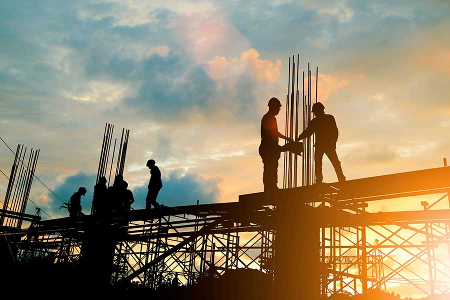 Individuals working together on a construction site