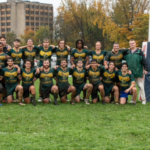 A photo of the men's rugby team after a game.