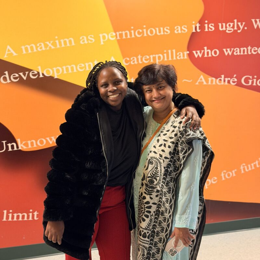 Beata Tatenda Moyo and Professor Sumona Mondal Taking a standing photo together with  one arm around each other's shoulder